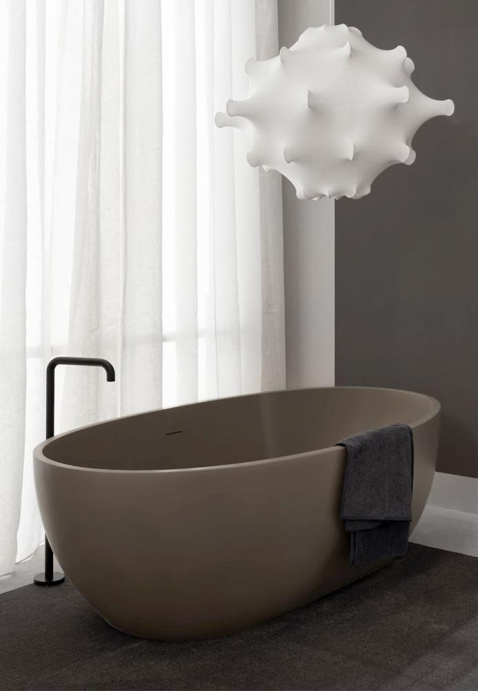 Freestanding-bathtub-in-living-tec-sandstone-ceramic-sky