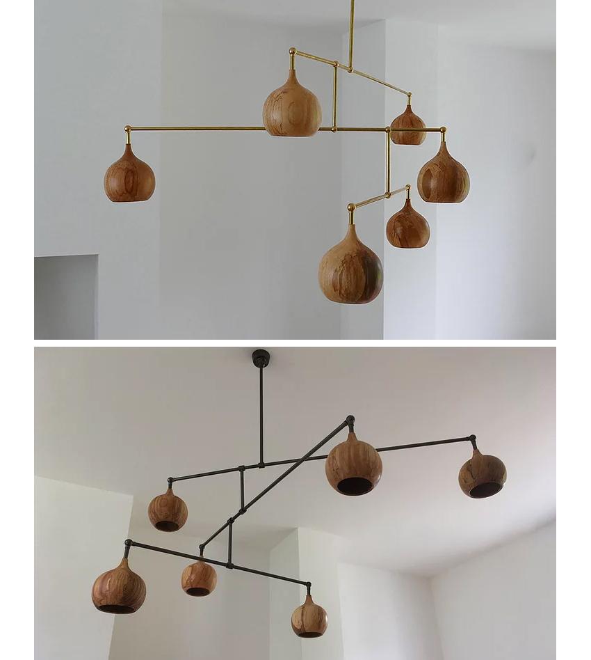 Pendant-lamps-in-wood-dome-chandelier-by-tamasine-osher