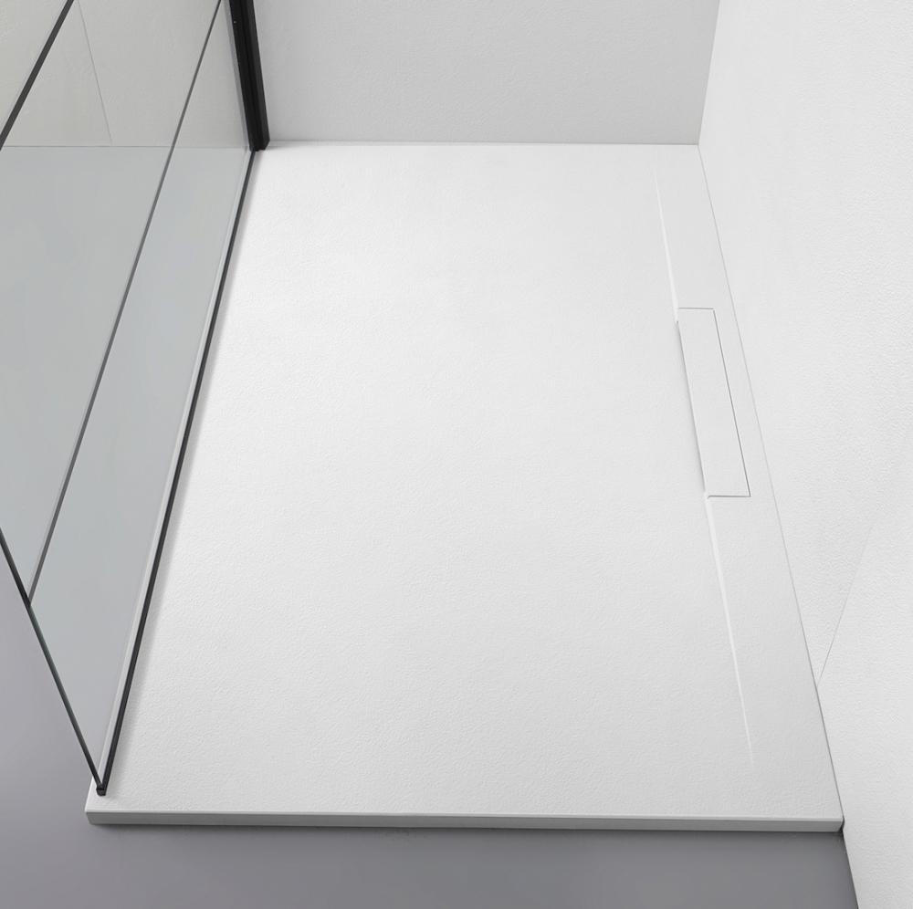Linear-matt-shower-tray-and-brushing-photo-kinedo